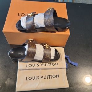 Louis Vuitton Mules size 7.